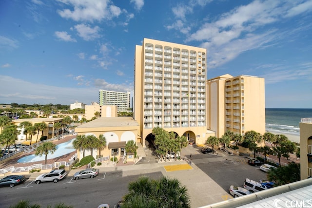 view of building exterior with a water view