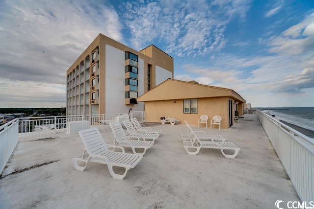 view of patio / terrace featuring a water view