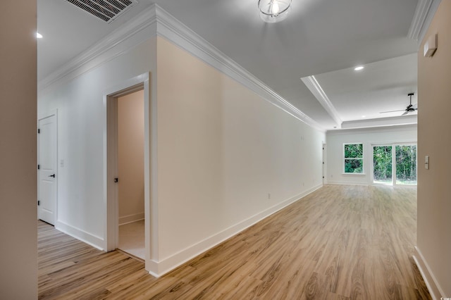 205 Brush Ct, Little River, SC 29566 - corridor featuring ornamental molding, light wood-style flooring, baseboards, recessed lighting, and a tray ceiling