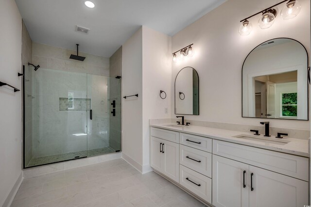 205 Brush Ct, Little River, SC 29566 - full bathroom with a shower stall, double vanity, and baseboards