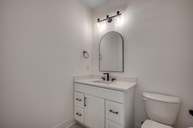 205 Brush Ct, Little River, SC 29566 - bathroom with toilet, vanity, and baseboards