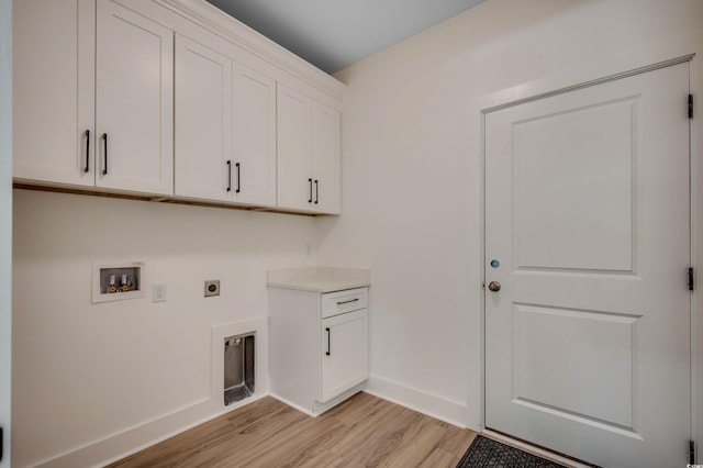 205 Brush Ct, Little River, SC 29566 - washroom with light wood-style flooring, hookup for a washing machine, cabinet space, baseboards, and electric dryer hookup