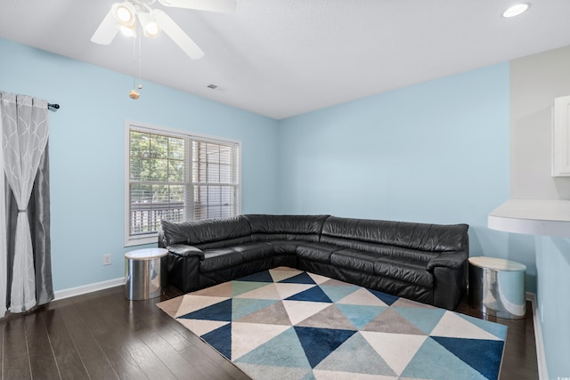 living room featuring dark wood-type flooring