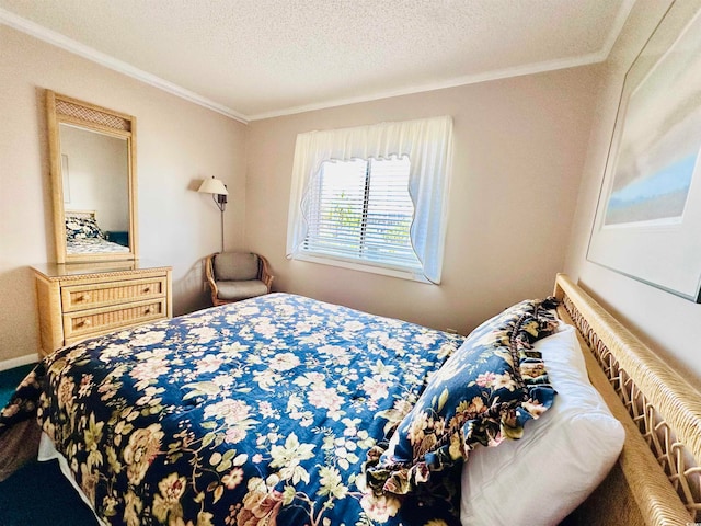 bedroom featuring ornamental molding and a textured ceiling