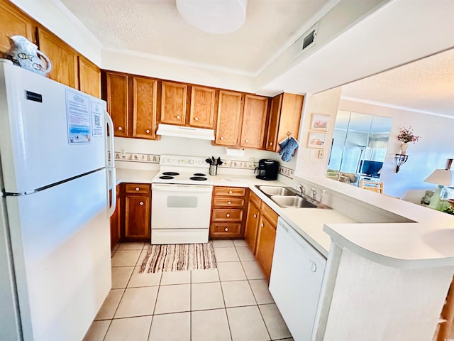 kitchen with ornamental molding, white appliances, kitchen peninsula, sink, and light tile flooring