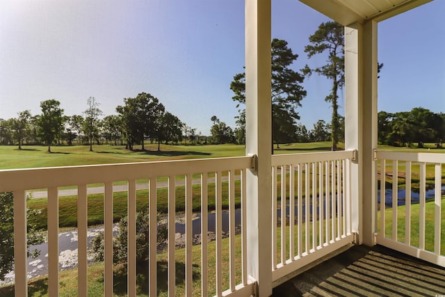 wooden terrace with a yard