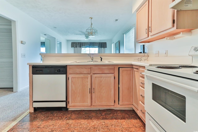 kitchen with sink, white appliances, light brown cabinetry, and ventilation hood