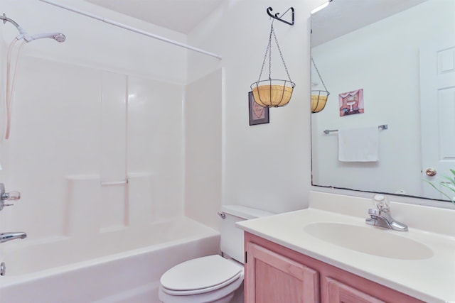 full bathroom with toilet, vanity, and shower / bath combination