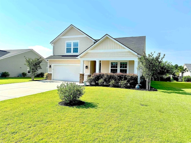 craftsman inspired home featuring a front yard and a garage