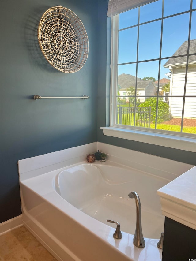 bathroom featuring a washtub