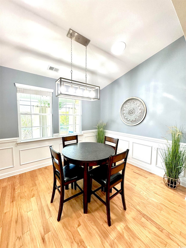 dining room featuring light hardwood / wood-style flooring