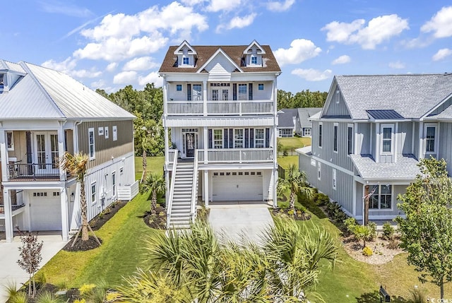 view of front facade featuring french doors, a balcony, a front lawn, a porch, and a garage