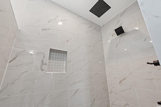 details with a tile shower