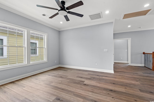 unfurnished room featuring ceiling fan, ornamental molding, and hardwood / wood-style floors