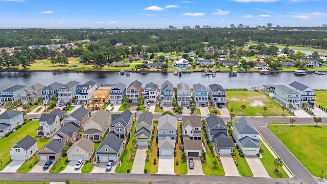 birds eye view of property featuring a water view