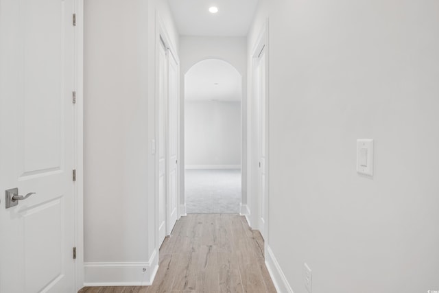 corridor featuring light hardwood / wood-style flooring