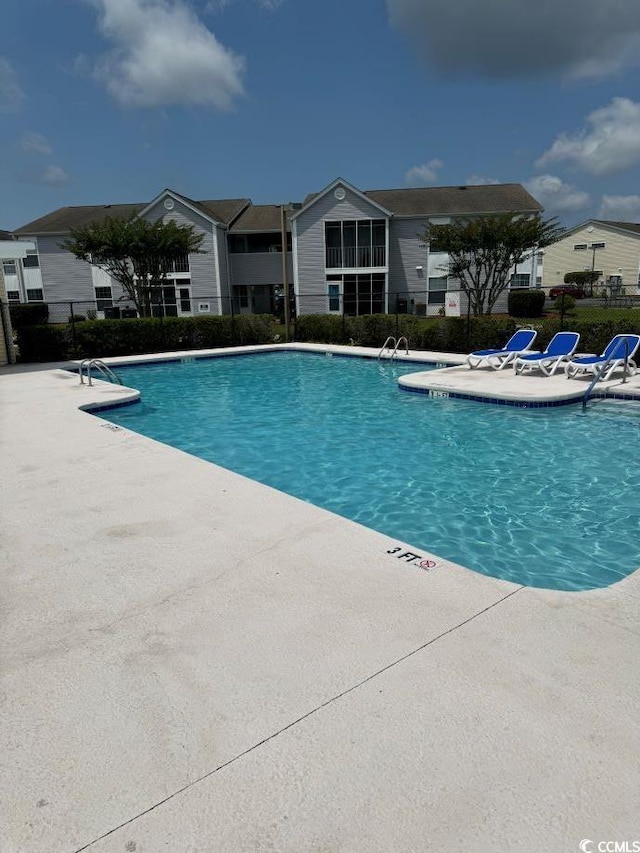 view of pool with a patio