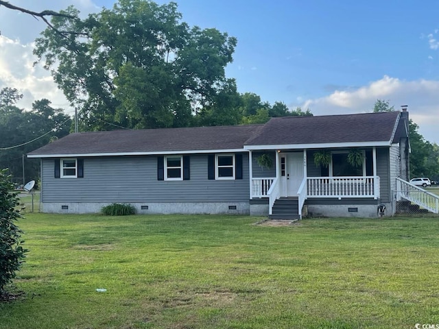 view of front of property with covered porch and a front yard