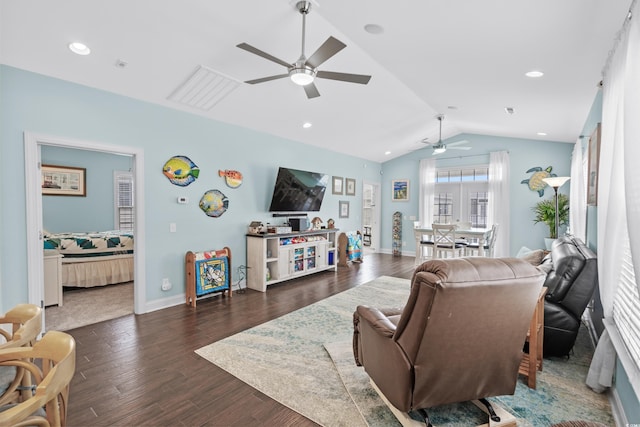 living room with ceiling fan, dark hardwood / wood-style flooring, and vaulted ceiling