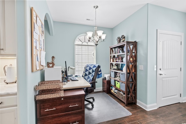 office featuring a notable chandelier