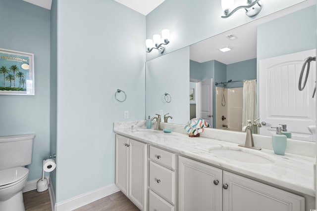 full bathroom featuring shower / bath combo, vanity, toilet, and hardwood / wood-style floors