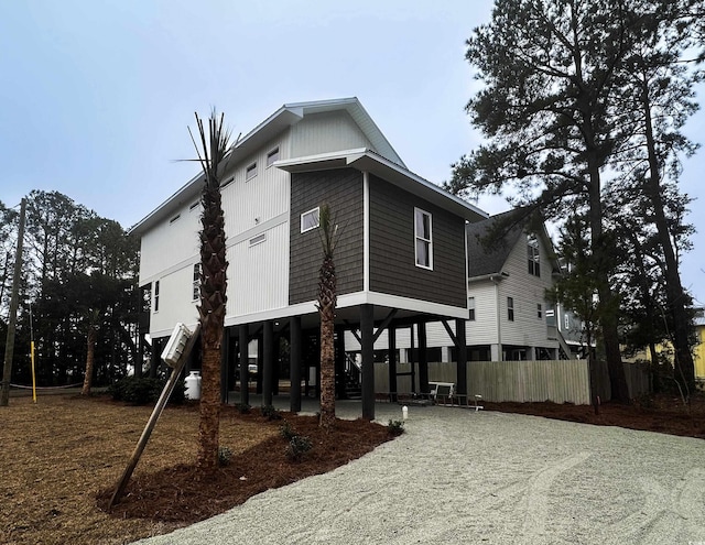 view of side of home featuring a carport