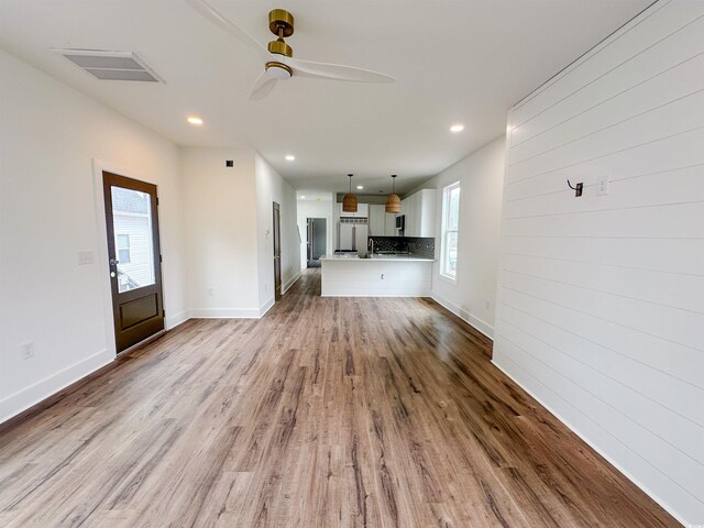 189 Brown Pelican Loop, Pawleys Island, SC 29585 - unfurnished living room with dark wood finished floors, recessed lighting, a ceiling fan, and baseboards