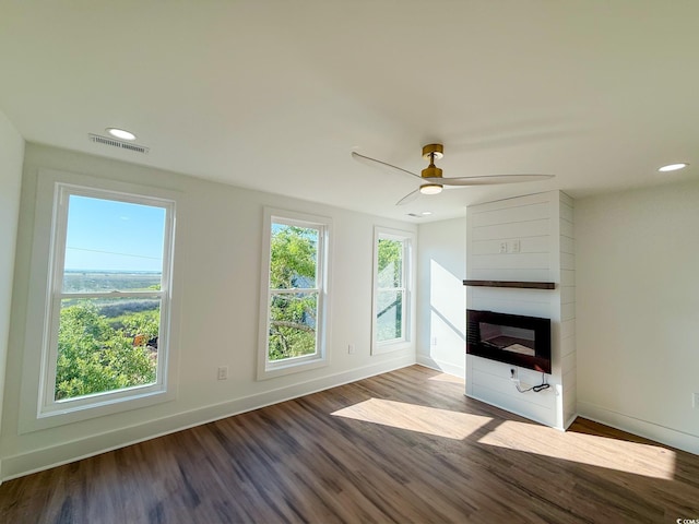 189 Brown Pelican Loop, Pawleys Island, SC 29585 - unfurnished living room with wood finished floors, a fireplace, baseboards, recessed lighting, and ceiling fan
