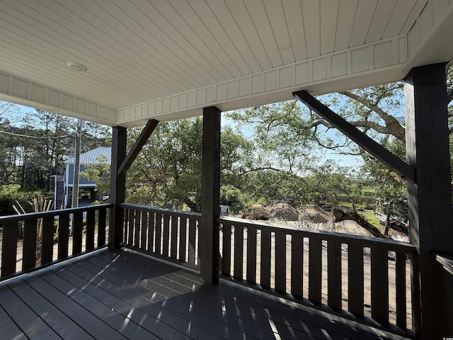189 Brown Pelican Loop, Pawleys Island, SC 29585 - wooden terrace featuring view of wooded area