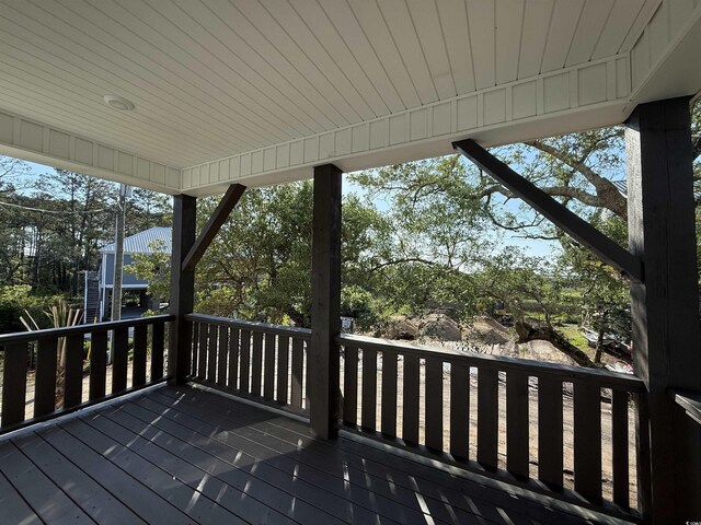 189 Brown Pelican Loop, Pawleys Island, SC 29585 - wooden terrace featuring view of wooded area