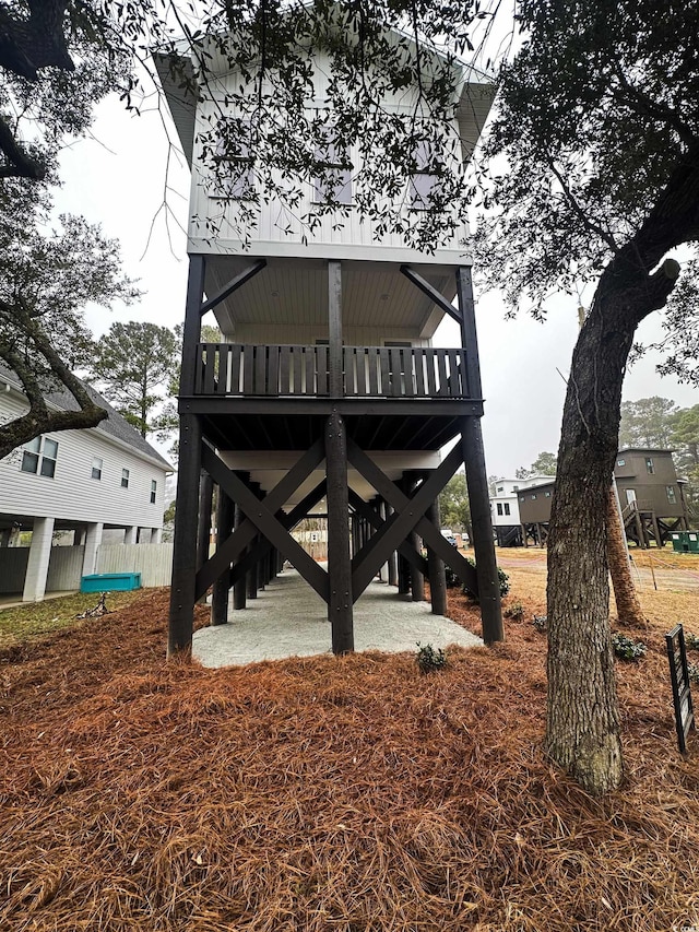 back of house featuring fence