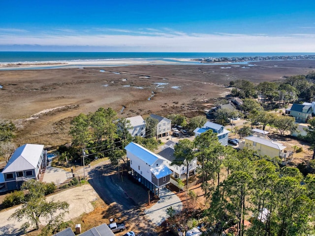 bird's eye view with a view of the beach and a water view