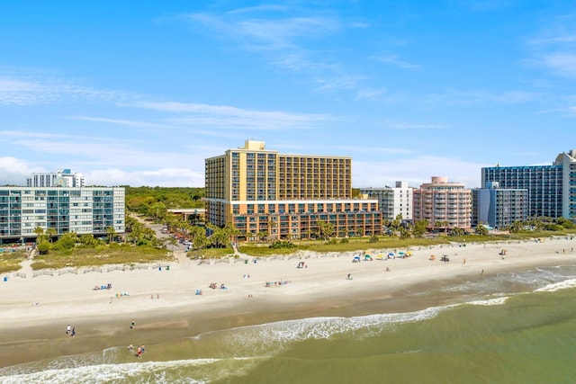 bird's eye view with a beach view and a water view