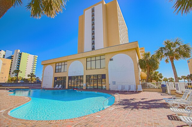 1207 S Ocean Blvd Unit 50606, Myrtle Beach, SC 29577 - view of swimming pool featuring a patio