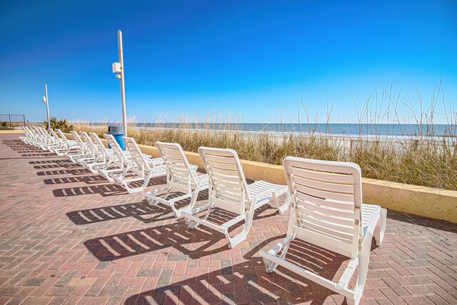 1207 S Ocean Blvd Unit 50606, Myrtle Beach, SC 29577 - view of patio featuring a water view