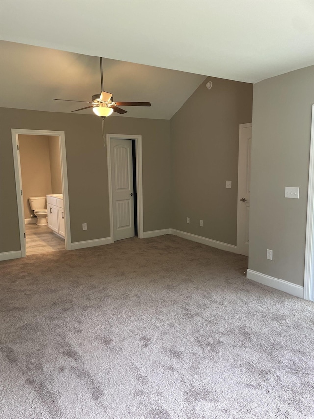 unfurnished room with ceiling fan and light carpet