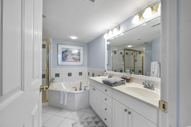 bathroom with double vanity, tile flooring, and plus walk in shower