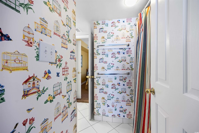 bathroom with tile flooring