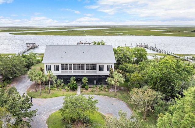 birds eye view of property featuring a water view