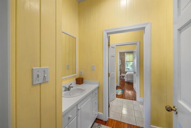 bathroom featuring wood-type flooring and vanity