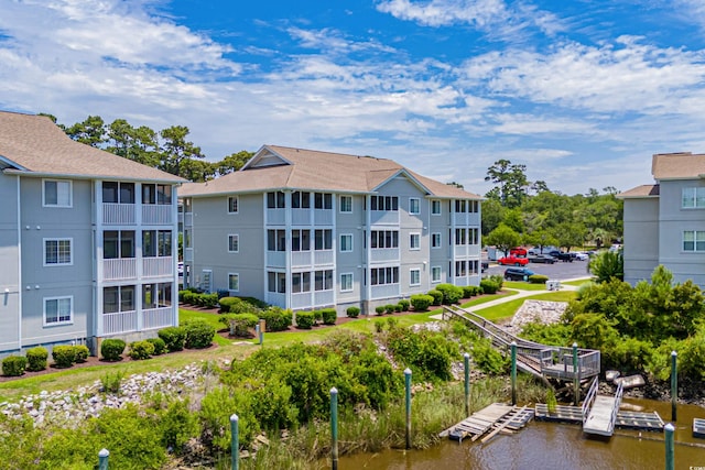 exterior space with a water view