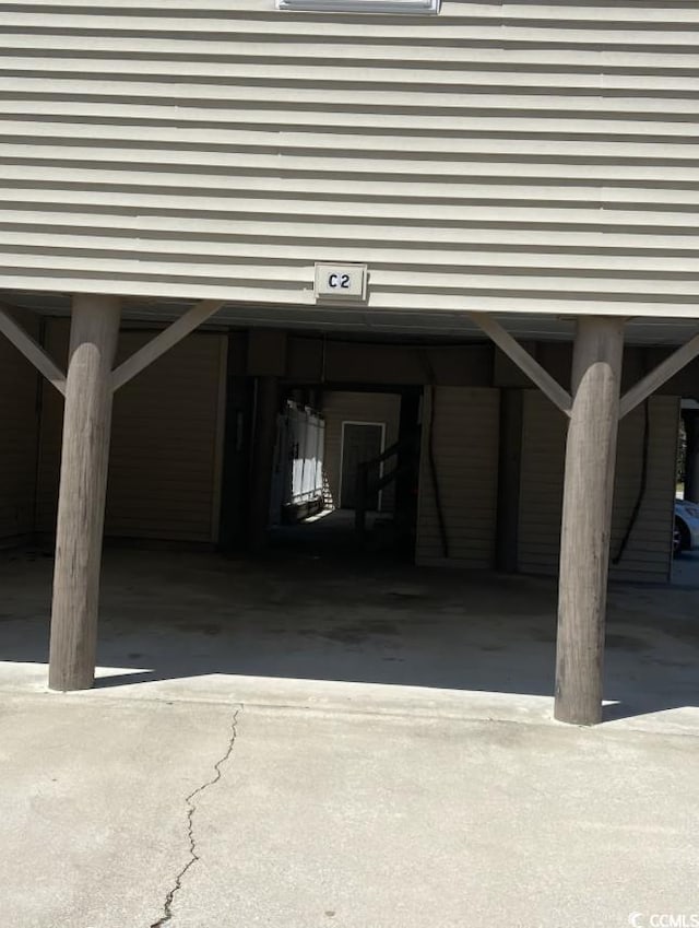 garage featuring a carport