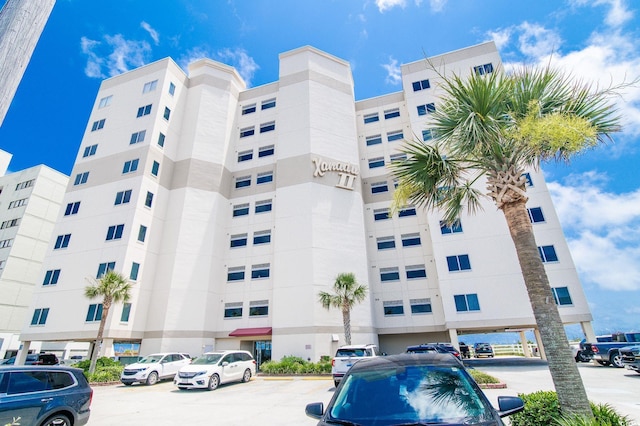 5800 N Ocean Blvd Unit 705, North Myrtle Beach, SC 29582 - view of apartment building / complex with uncovered parking