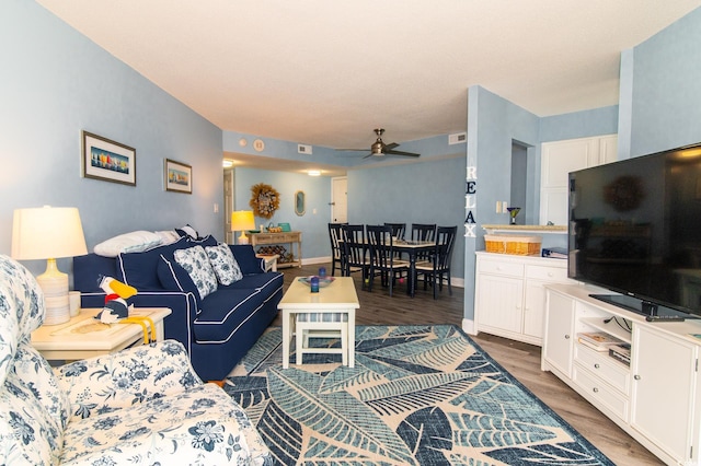 5800 N Ocean Blvd Unit 705, North Myrtle Beach, SC 29582 - living room featuring ceiling fan and wood finished floors