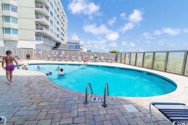5800 N Ocean Blvd Unit 705, North Myrtle Beach, SC 29582 - community pool featuring a patio