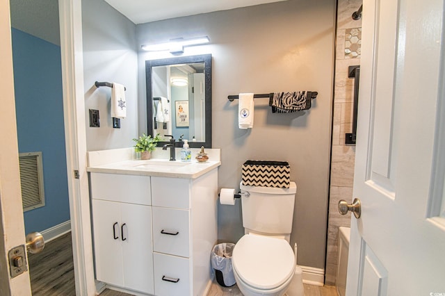 5800 N Ocean Blvd Unit 705, North Myrtle Beach, SC 29582 - bathroom with vanity, a shower, a tub to relax in, and wood finished floors