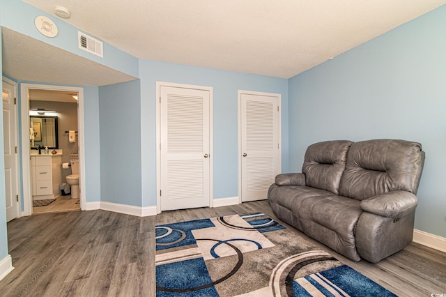 5800 N Ocean Blvd Unit 705, North Myrtle Beach, SC 29582 - living room featuring wood finished floors