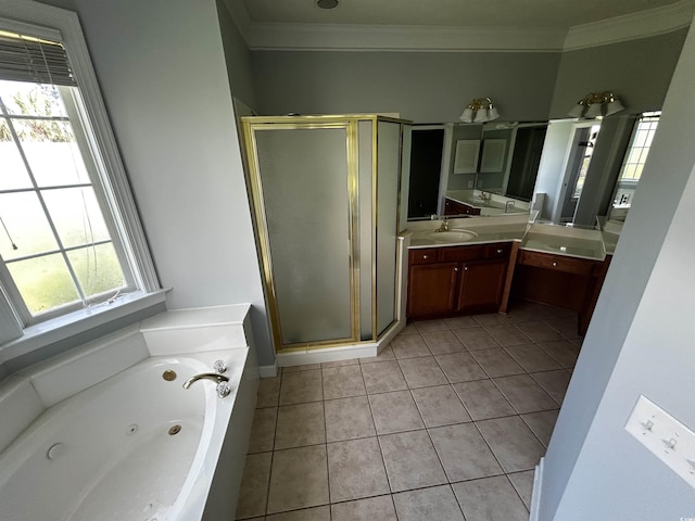 bathroom featuring tile patterned flooring, a shower stall, a tub with jets, and vanity