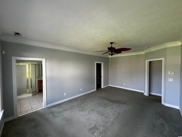 unfurnished bedroom featuring carpet flooring, visible vents, and baseboards