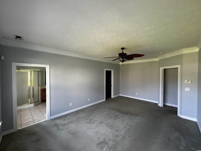 interior space with carpet floors, visible vents, and baseboards